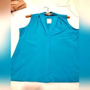 Calvin Klein V neck, sleeveless top with some spandex